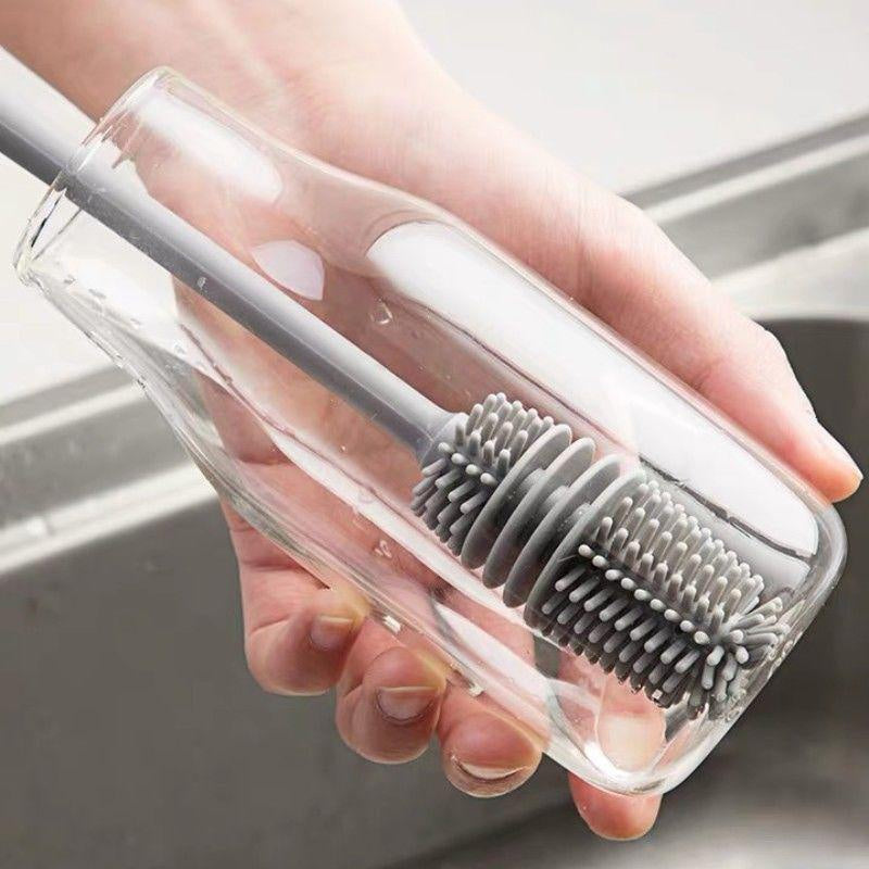 Cepillo de silicona para limpiar biberones, vasos y botellas de vidrio.
